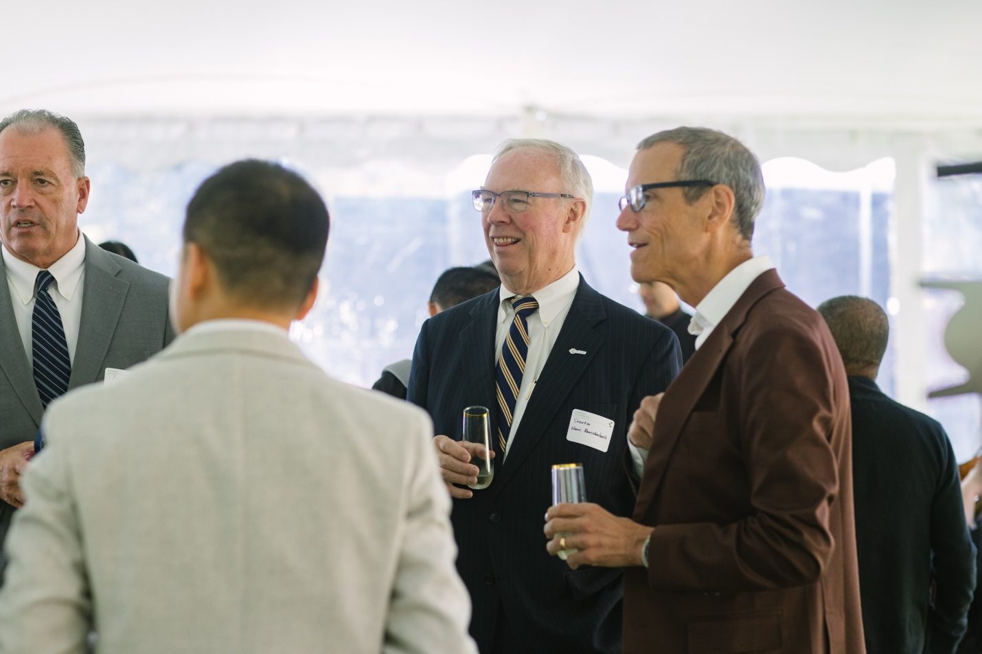 Guests networking during the anniversary celebration
